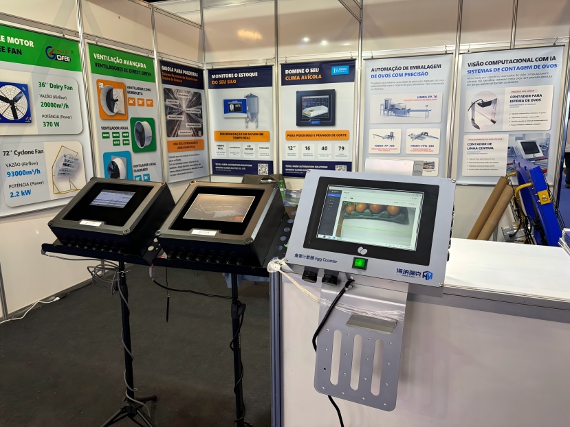 Poultry environmental controllers and HNRK-EC AI egg counter displayed at SIAVS 2026